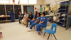 NU student nurses giving a talk at a Central Valley high school about nursing. View 1