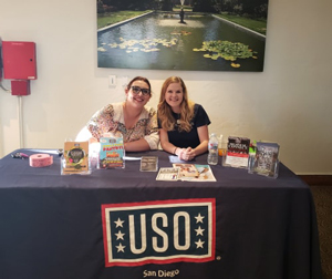 NU student (right) volunteering with USO. View 1