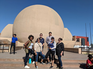 NU students in front of structure in Tijuana. View 1