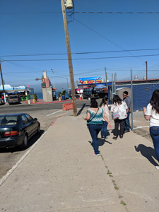 NU students walking in Tijuana. View 1